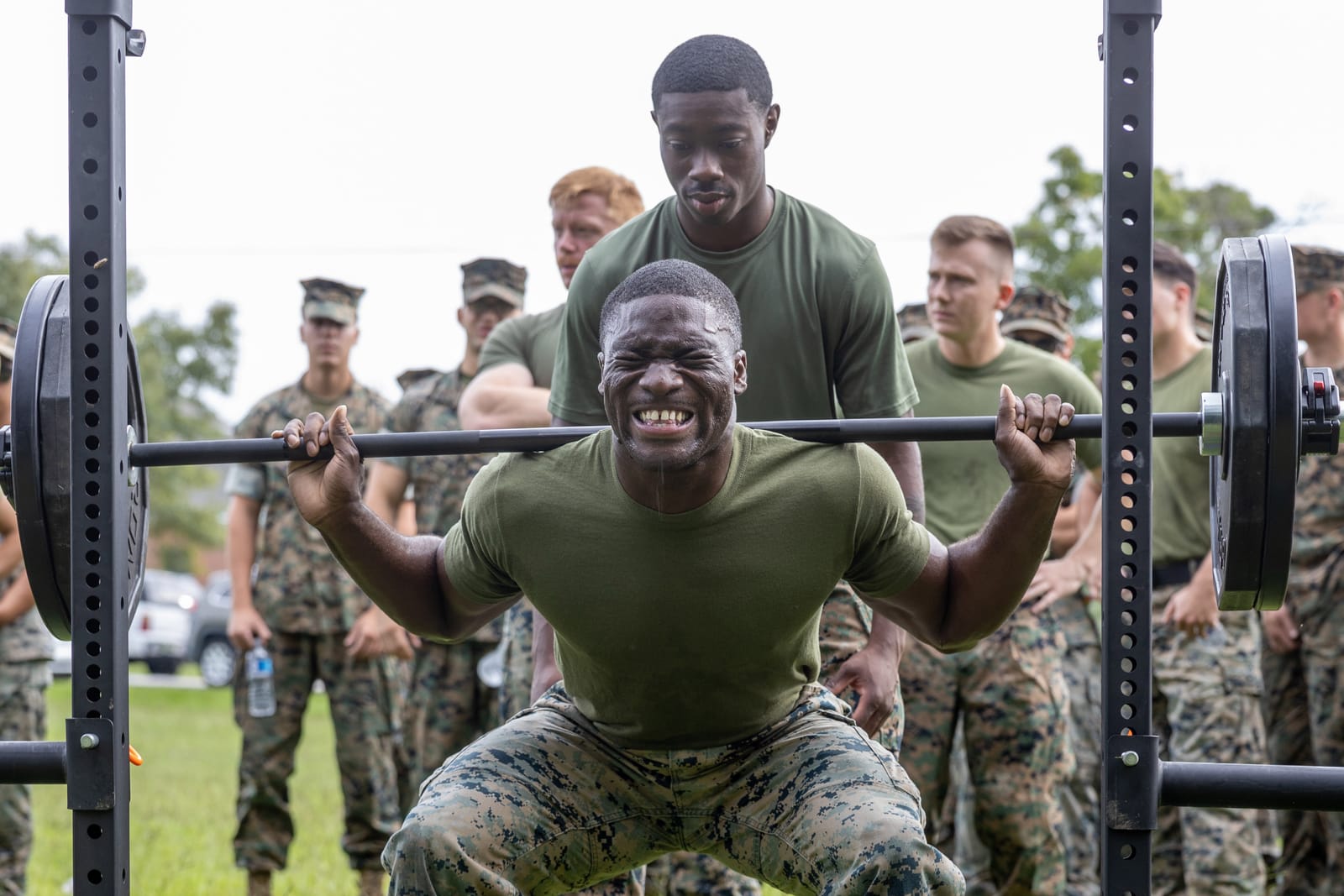 High-bar back squat at the bottom of the hole.