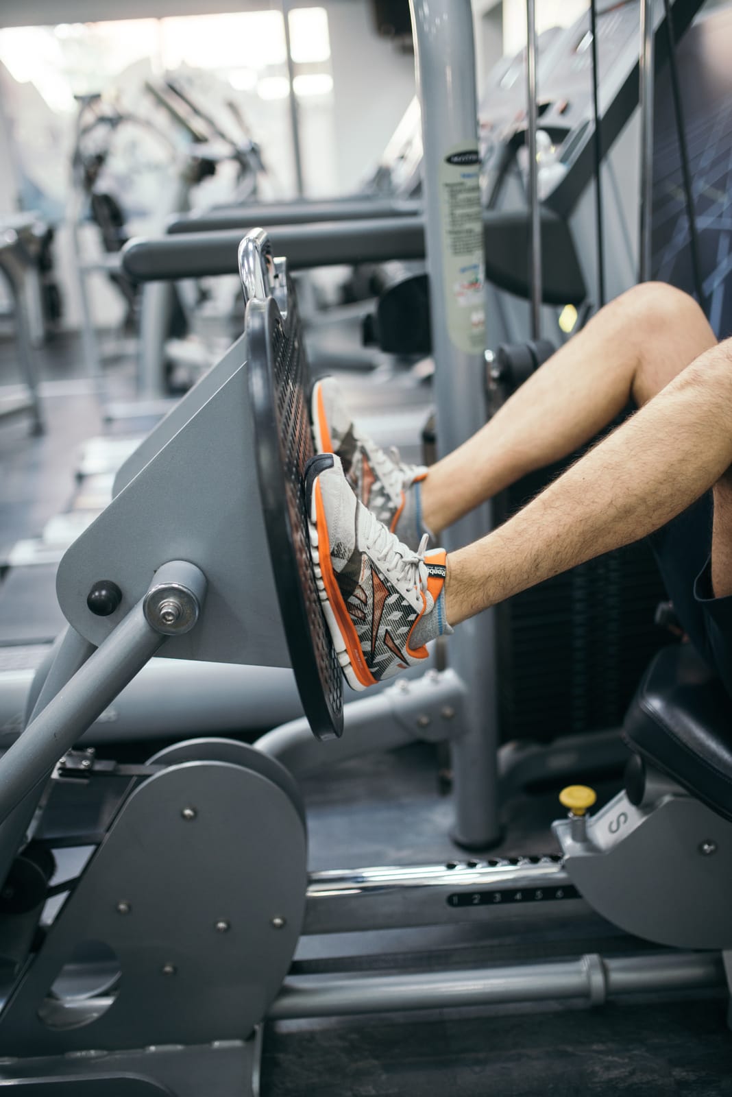Seated horizontal leg press at mid-range.